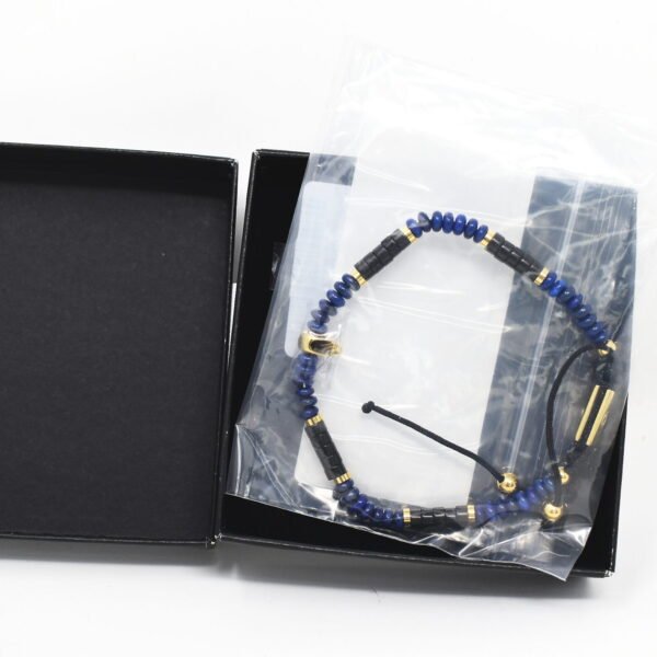 Northskull black onyx lapis and gold atticus skull macrame bracelet STMAYG2221LP