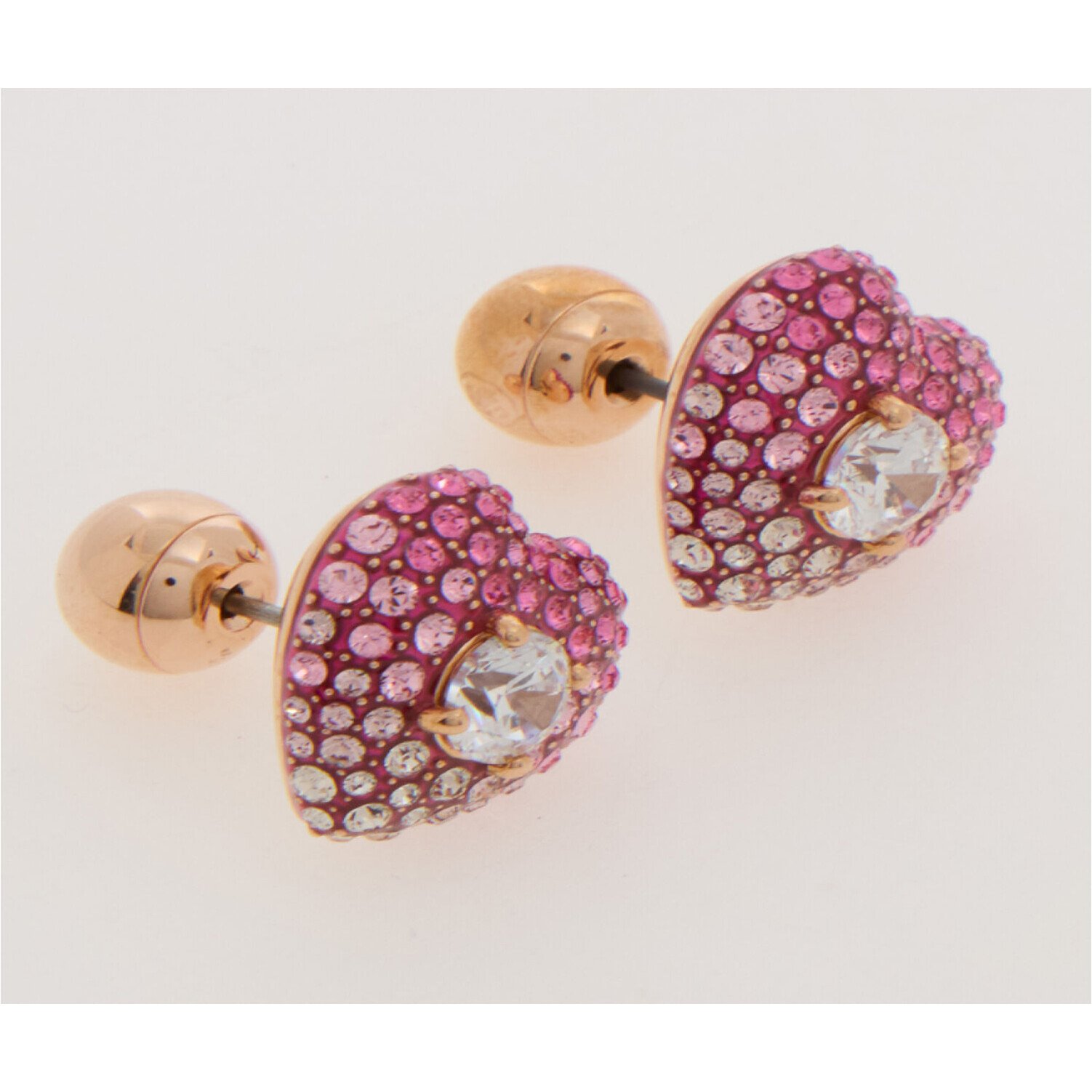 Swarovski Earrings Idyllia Heart Studs Pink Rose Gold Tone 10 Close-up of Swarovski Idyllia heart studs and butterfly fastenings